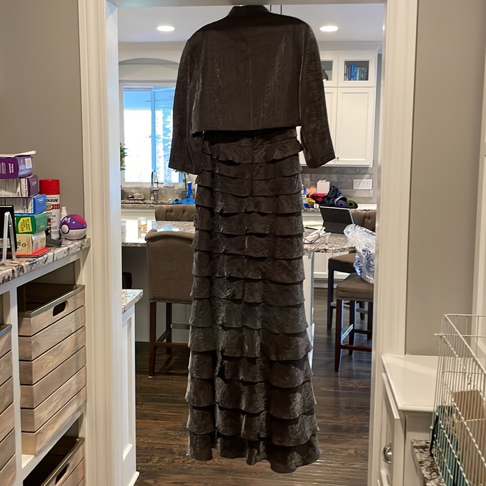 Brown metallic formal dress with matching jacket.